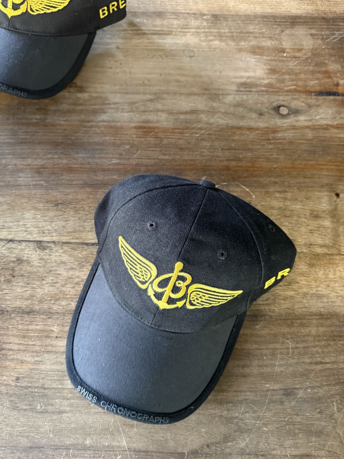Breitling Cap, schwarz mit gelbem Logo (zweites Exemplar)
