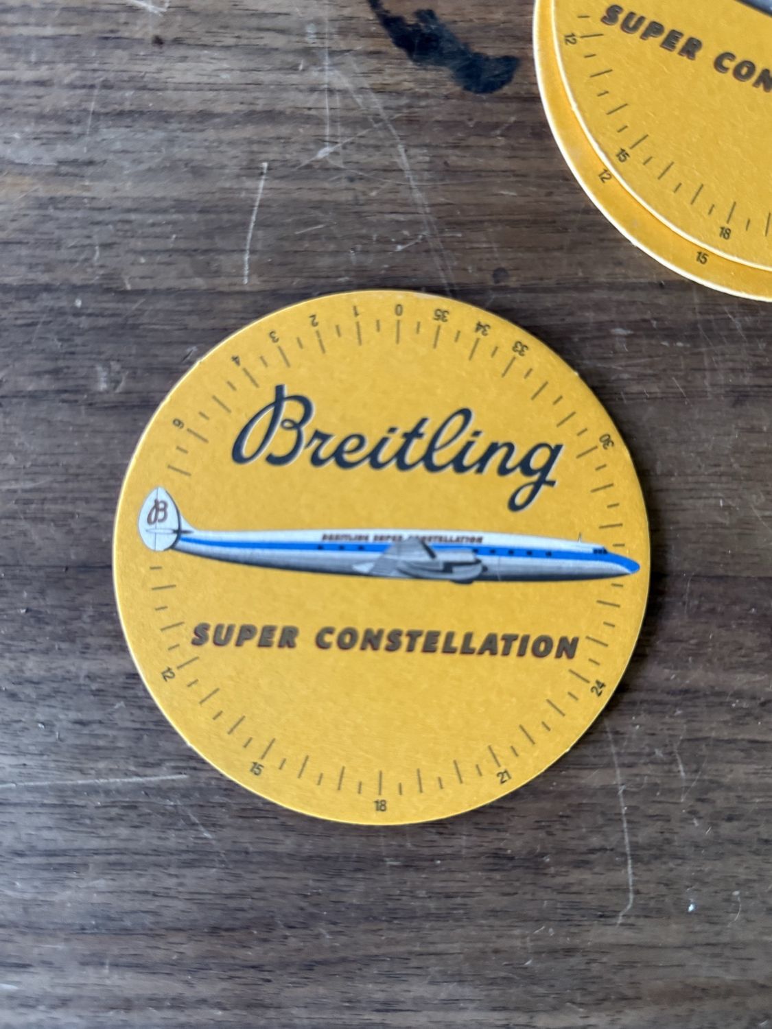 Breitling Untersetzer, Konvolut aus vier Stück