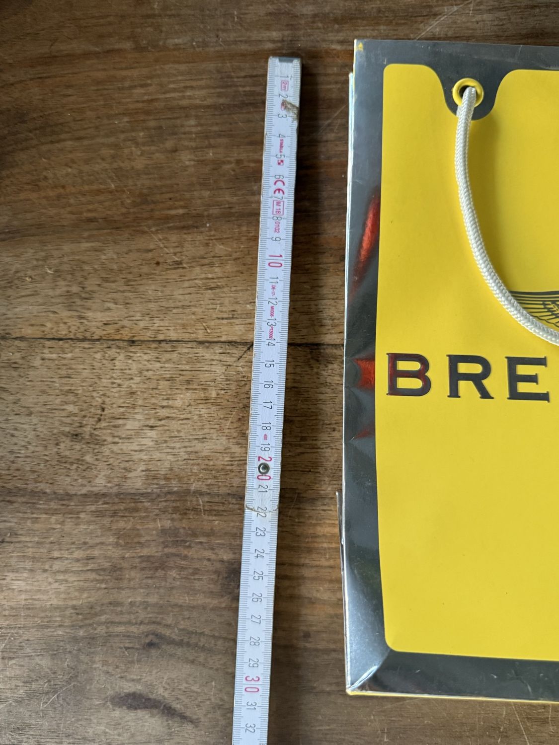 Breitling Papiertragtasche, gelb