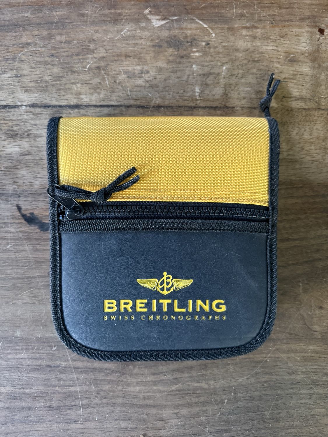 Breitling Dokumentenmappe, gelb und schwarz