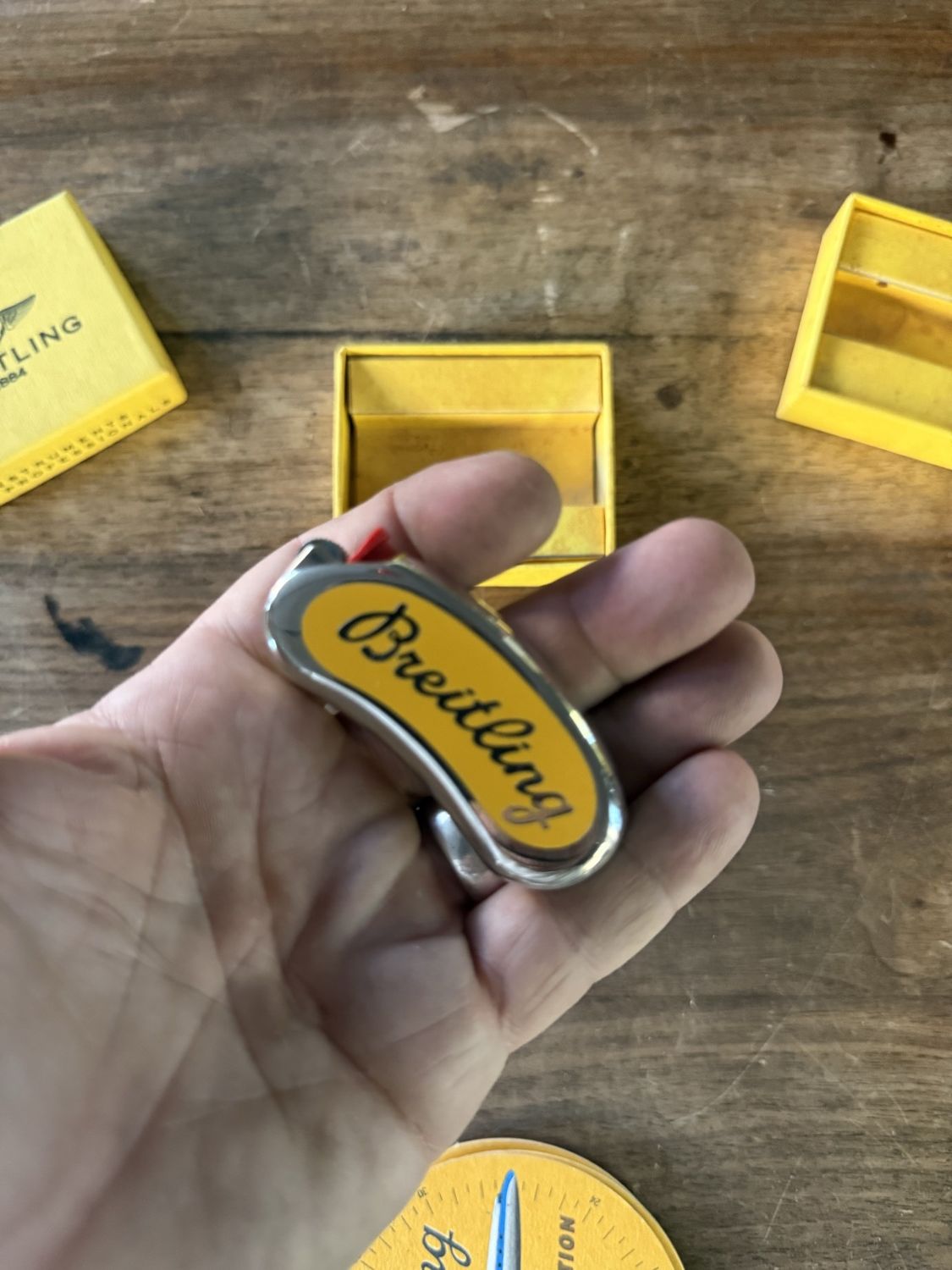Breitling Taschenmesser, gelb und verchromt, in Originalschachtel
