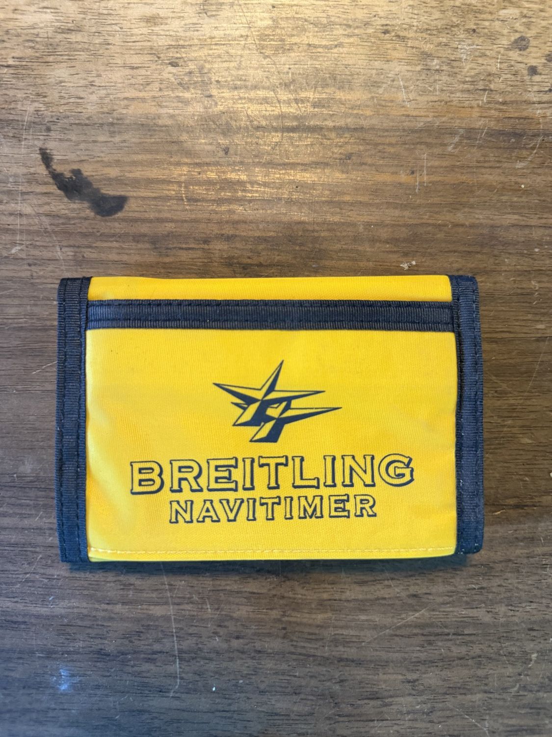 Breitling Navitimer Portemonnaie, gelb