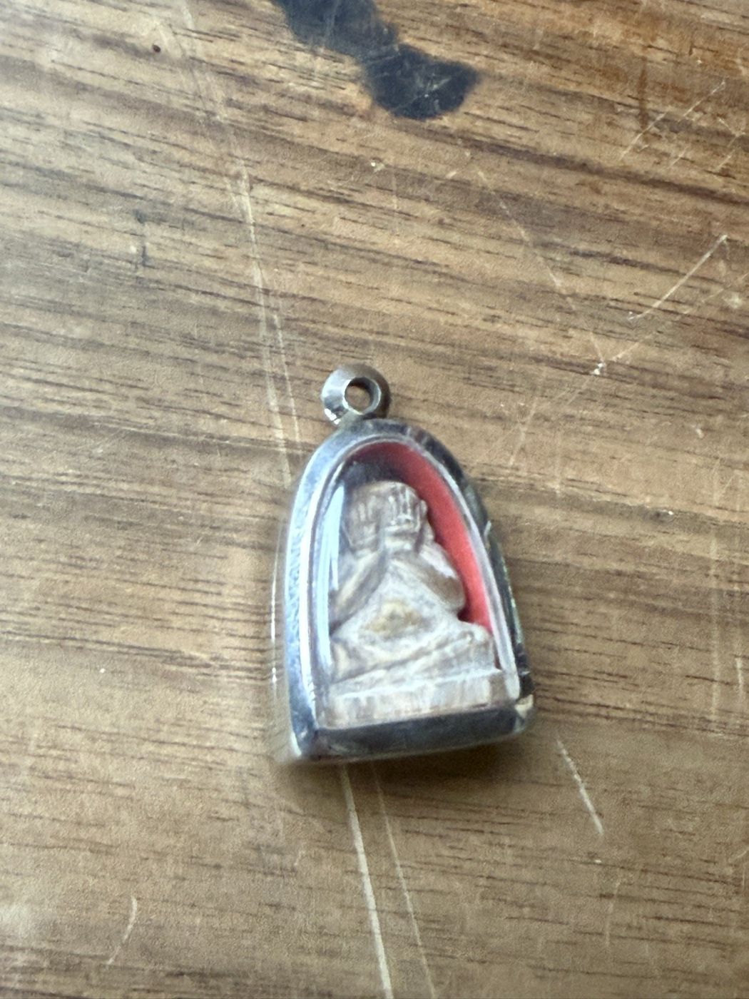 Buddhistisches Amulett im Silbergehäuse